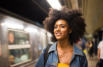 Woman smiling in subway