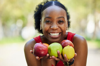 Eating the foods you love is one of the benefits of getting a dental bridge