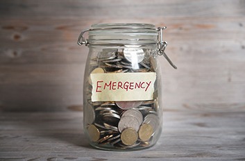 Jar of coins labeled Emergency